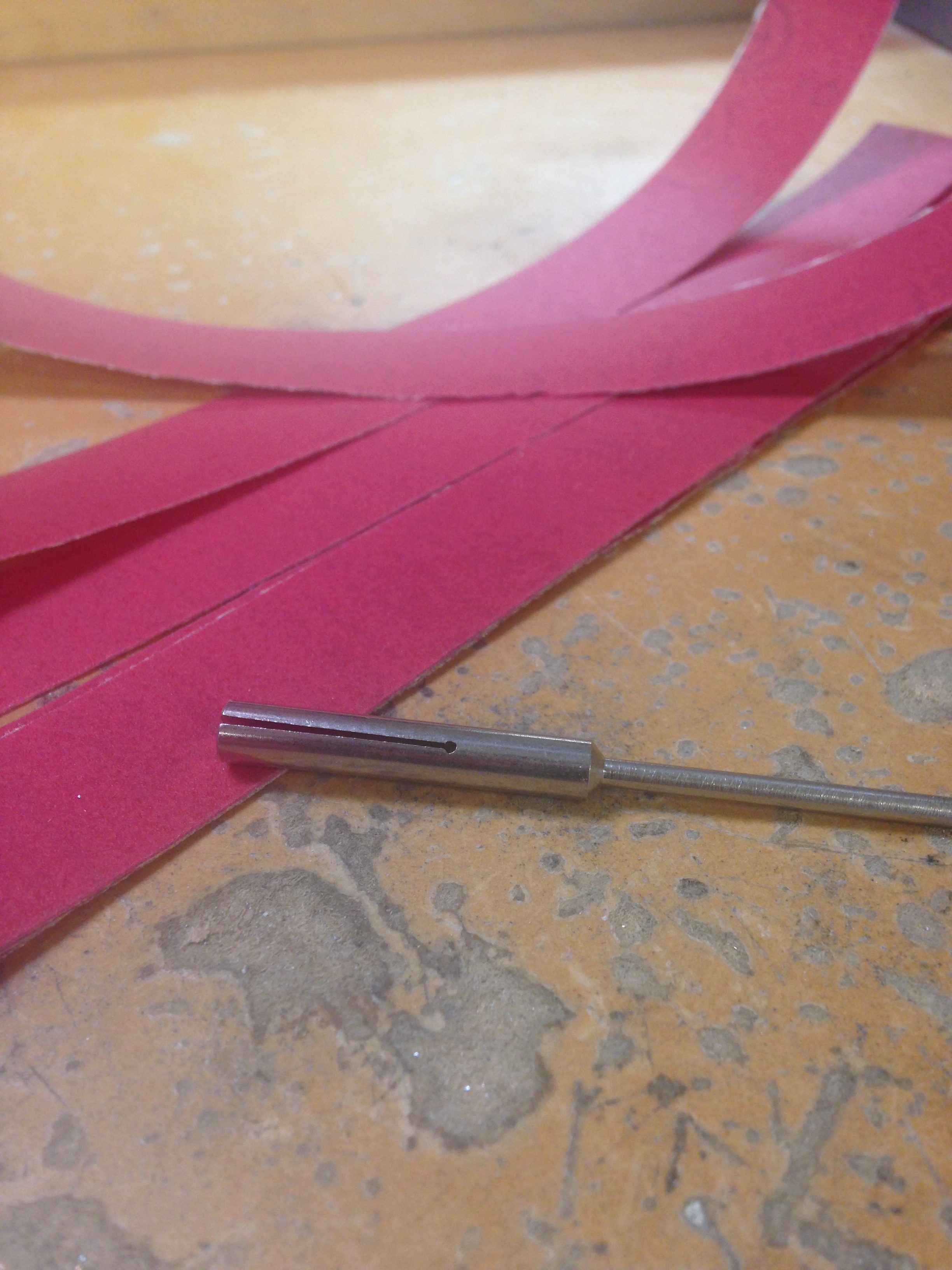 sand paper and drill tool