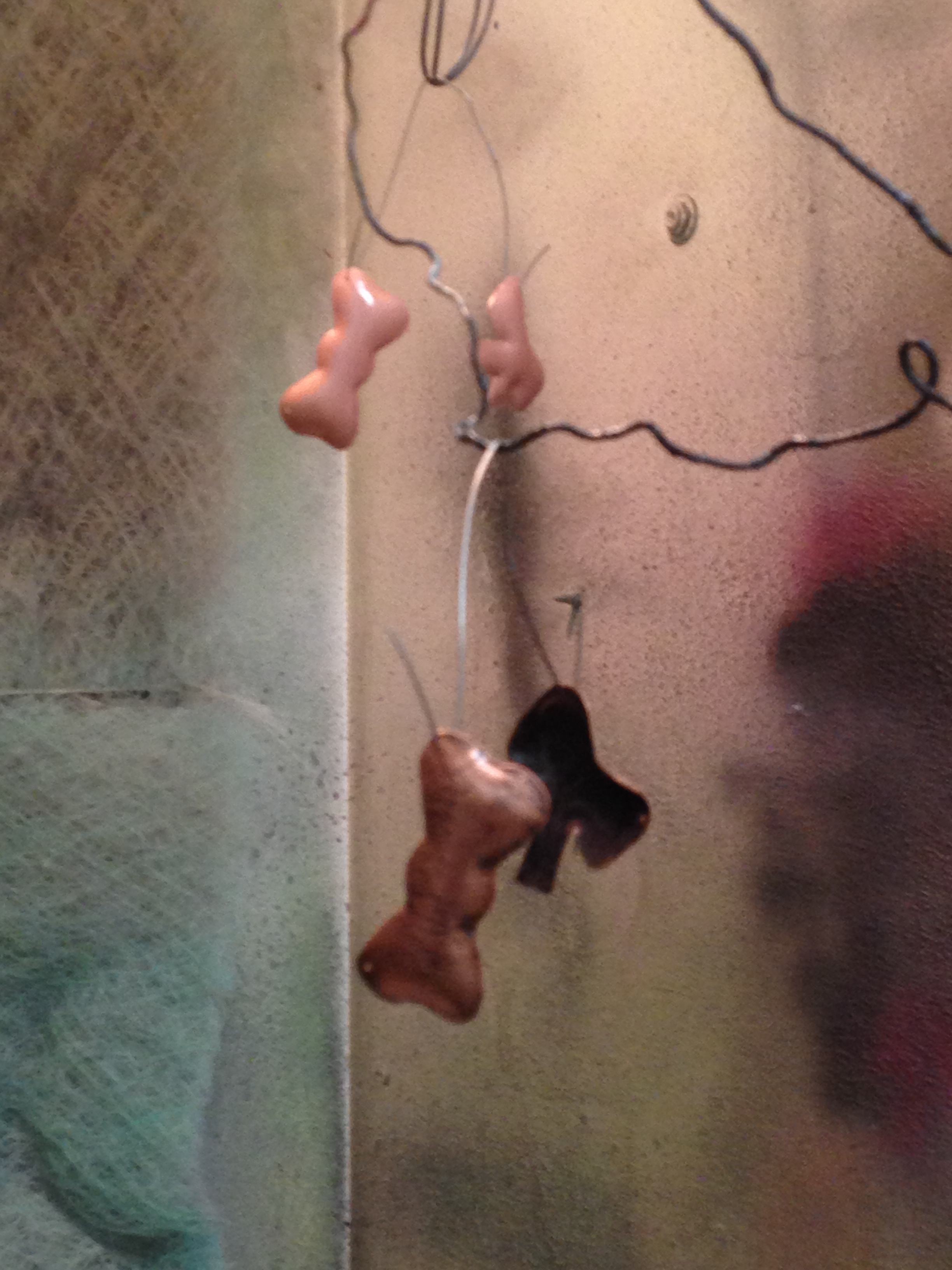 metal bows on hanging hooks