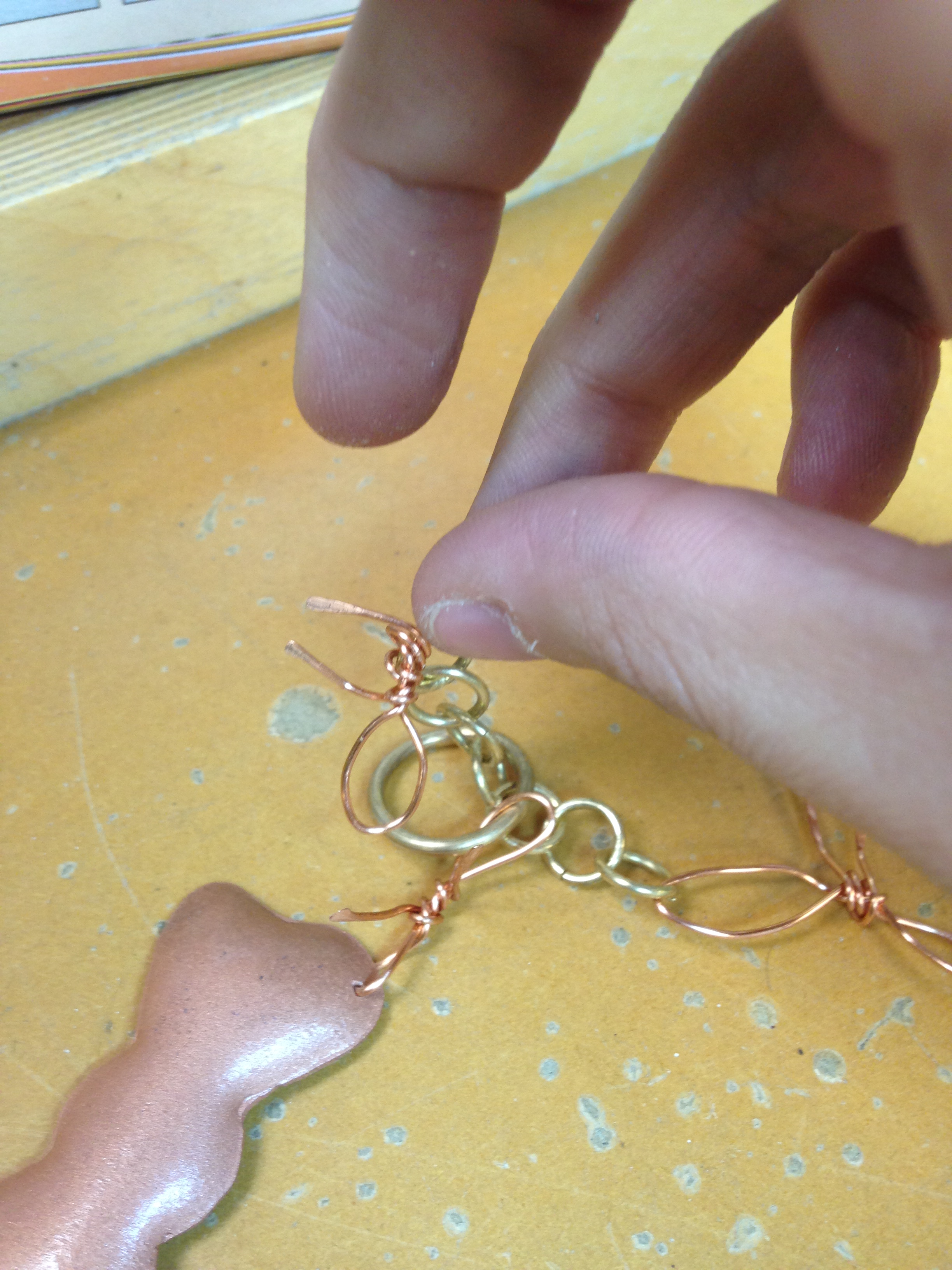 wire bow as clasp of the necklace