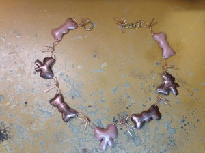 finished copper bow necklace
