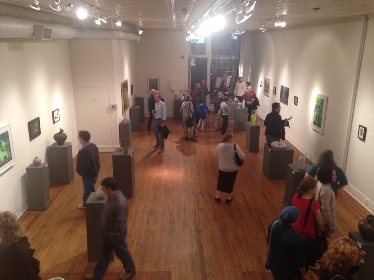 view of people viewing artwork in gallery