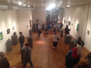 view of people viewing artwork in gallery