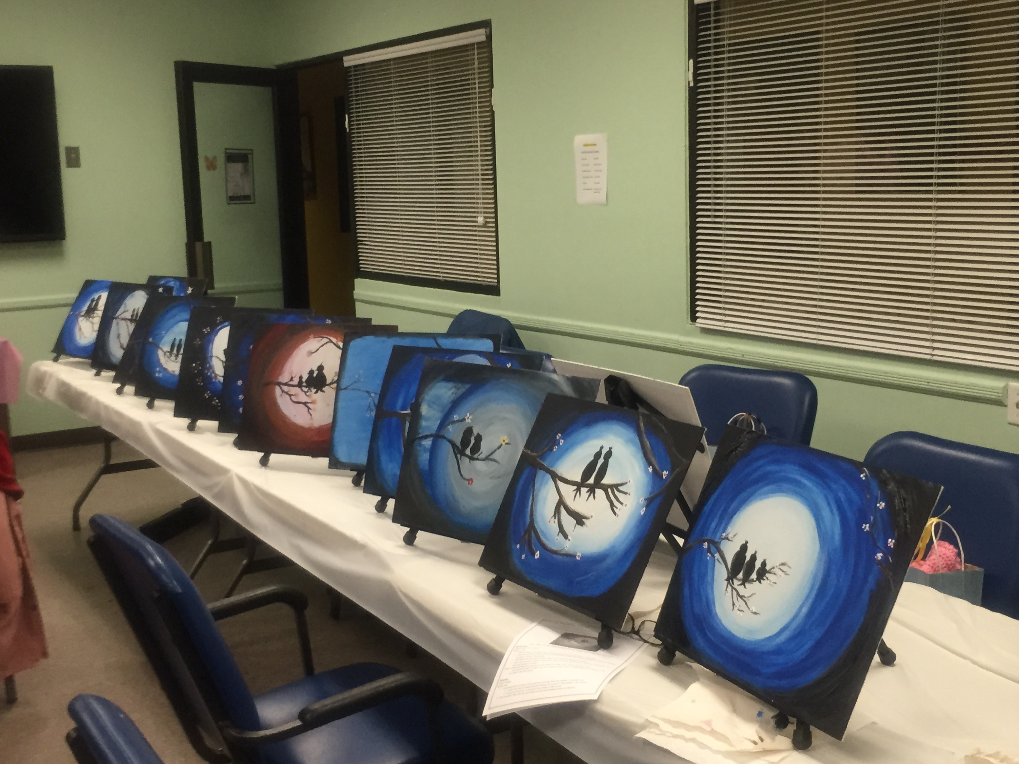 finished bird paintings at the senior center