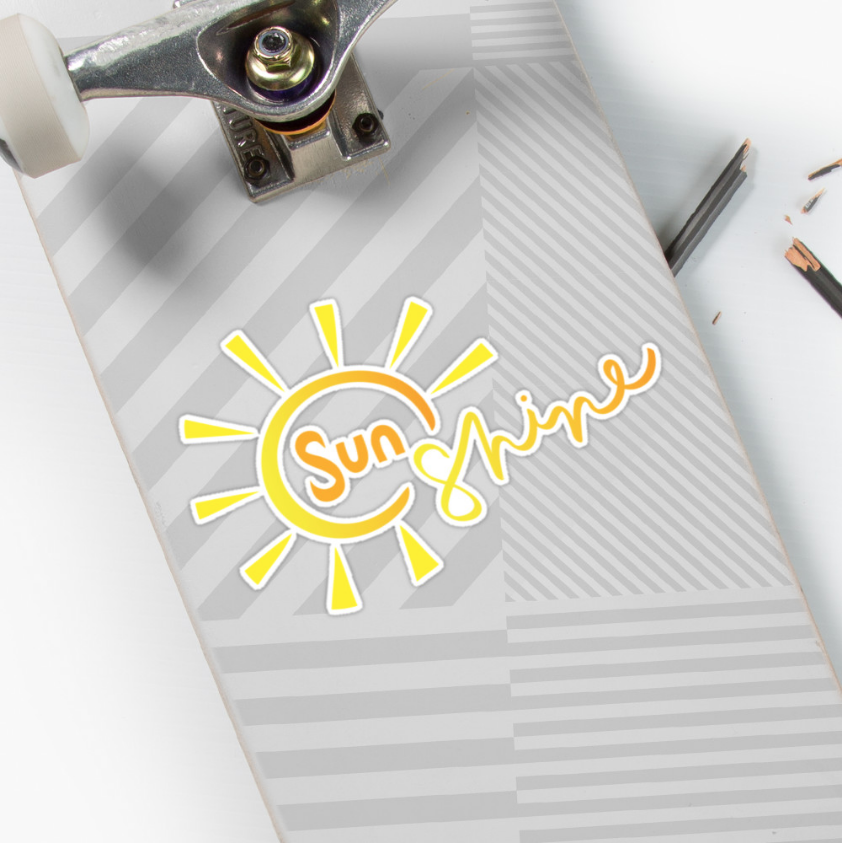 sunshine sticker on a skateboard