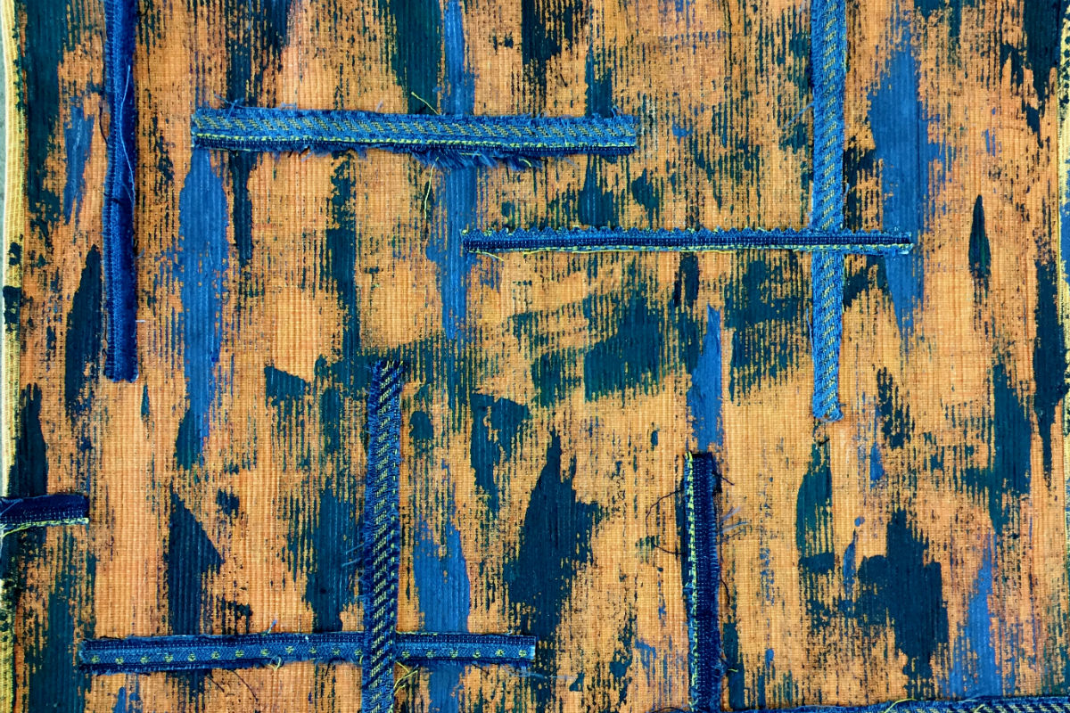 Abstract fabric and paint piece orange and blue