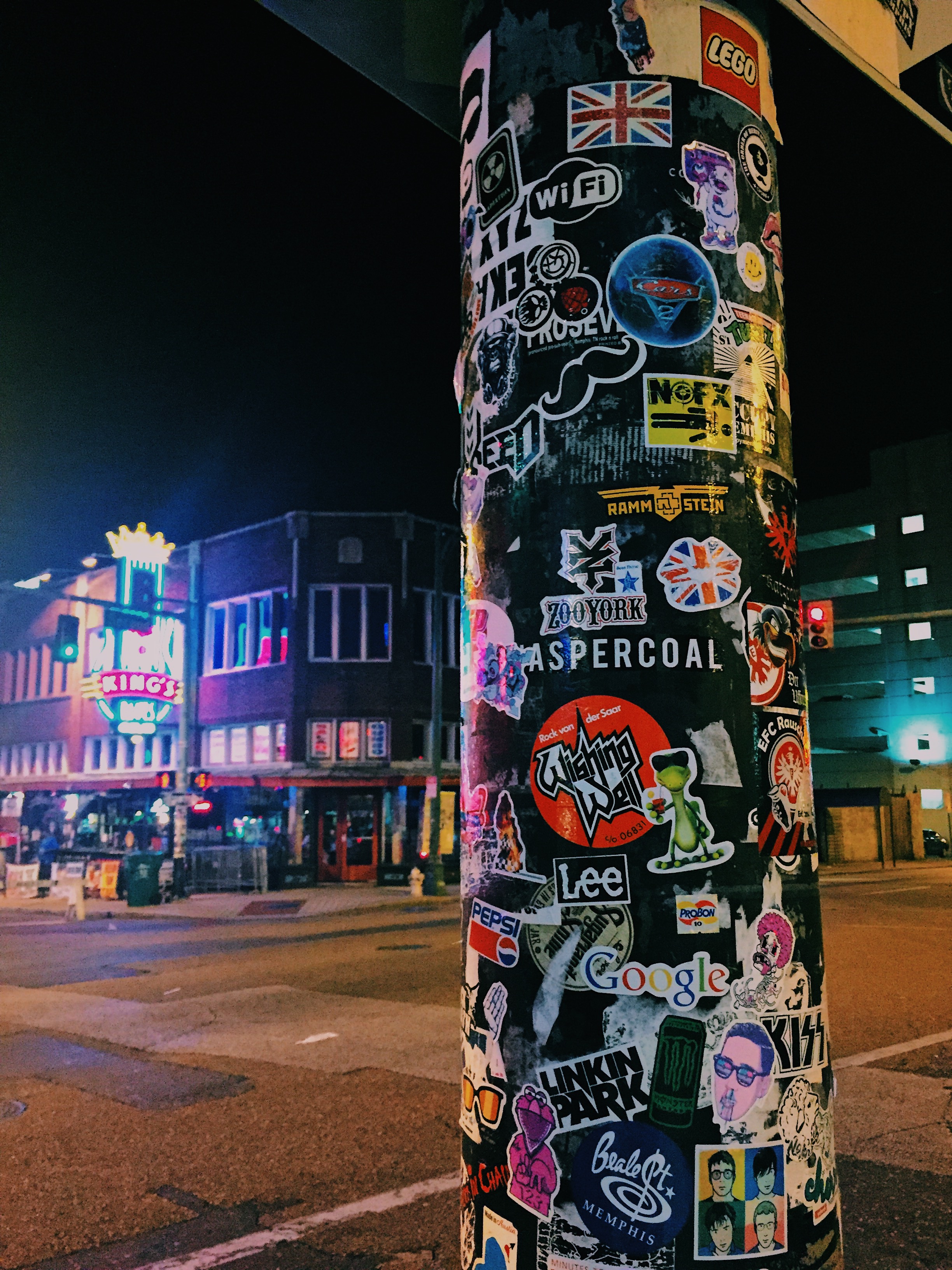 pole on Beale street covered in stickers