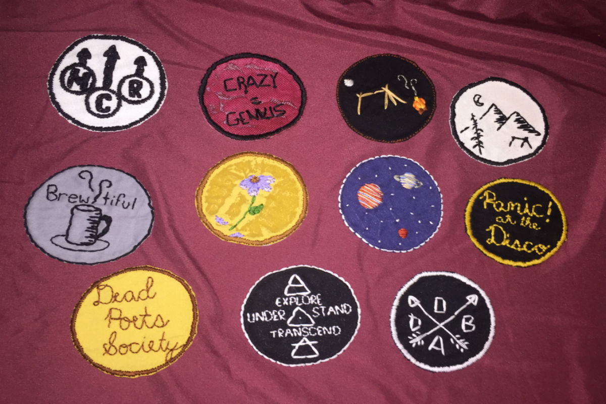 array of patches on maroon background