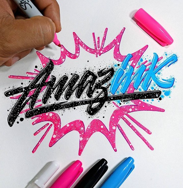 Amazink in pink, black, and blue