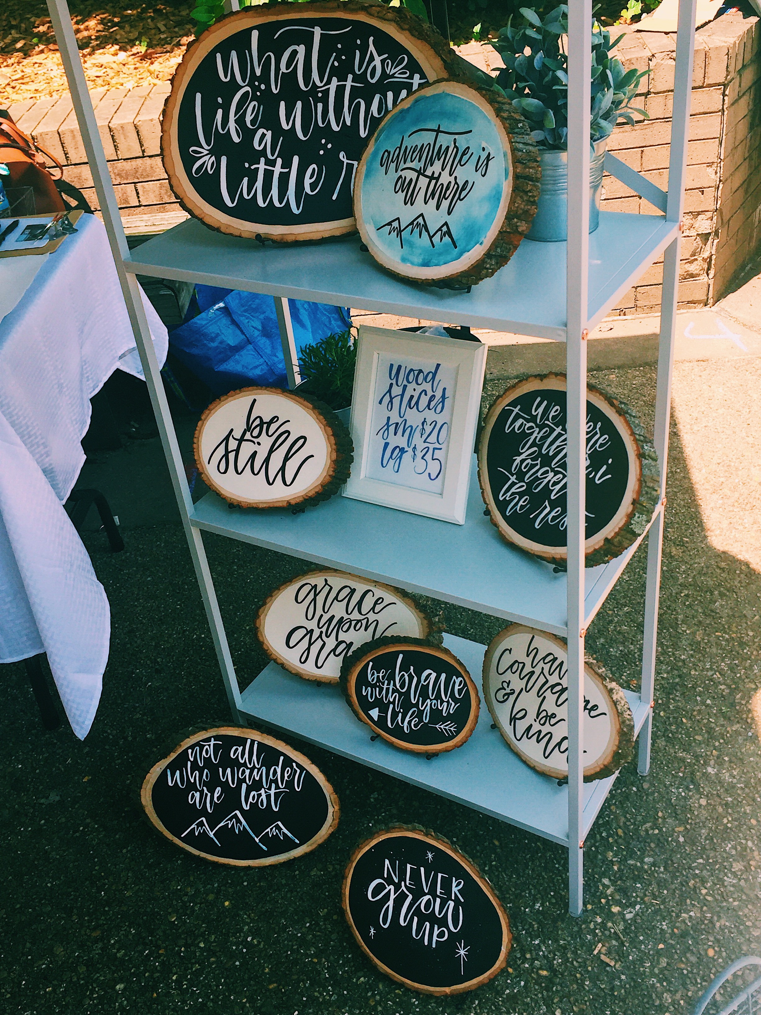 Rose Barbera handlettering on tree stumps