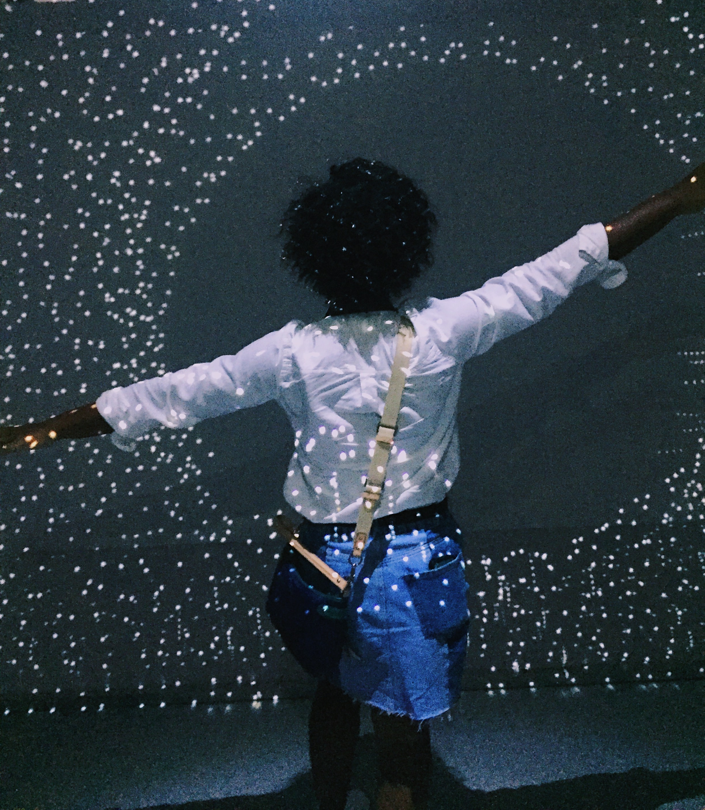 lights scattered around a person