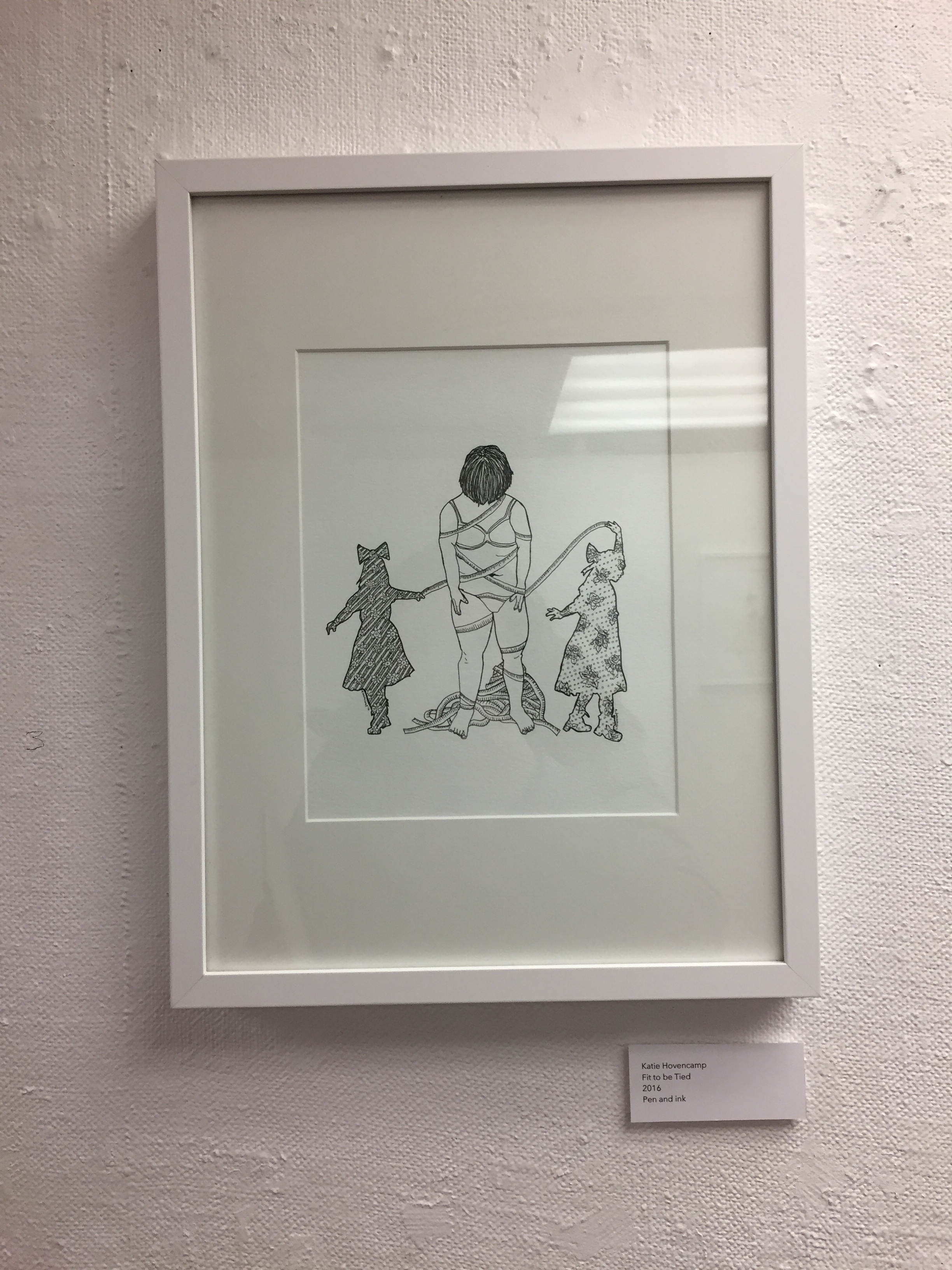 woman wrapped in measuring tape