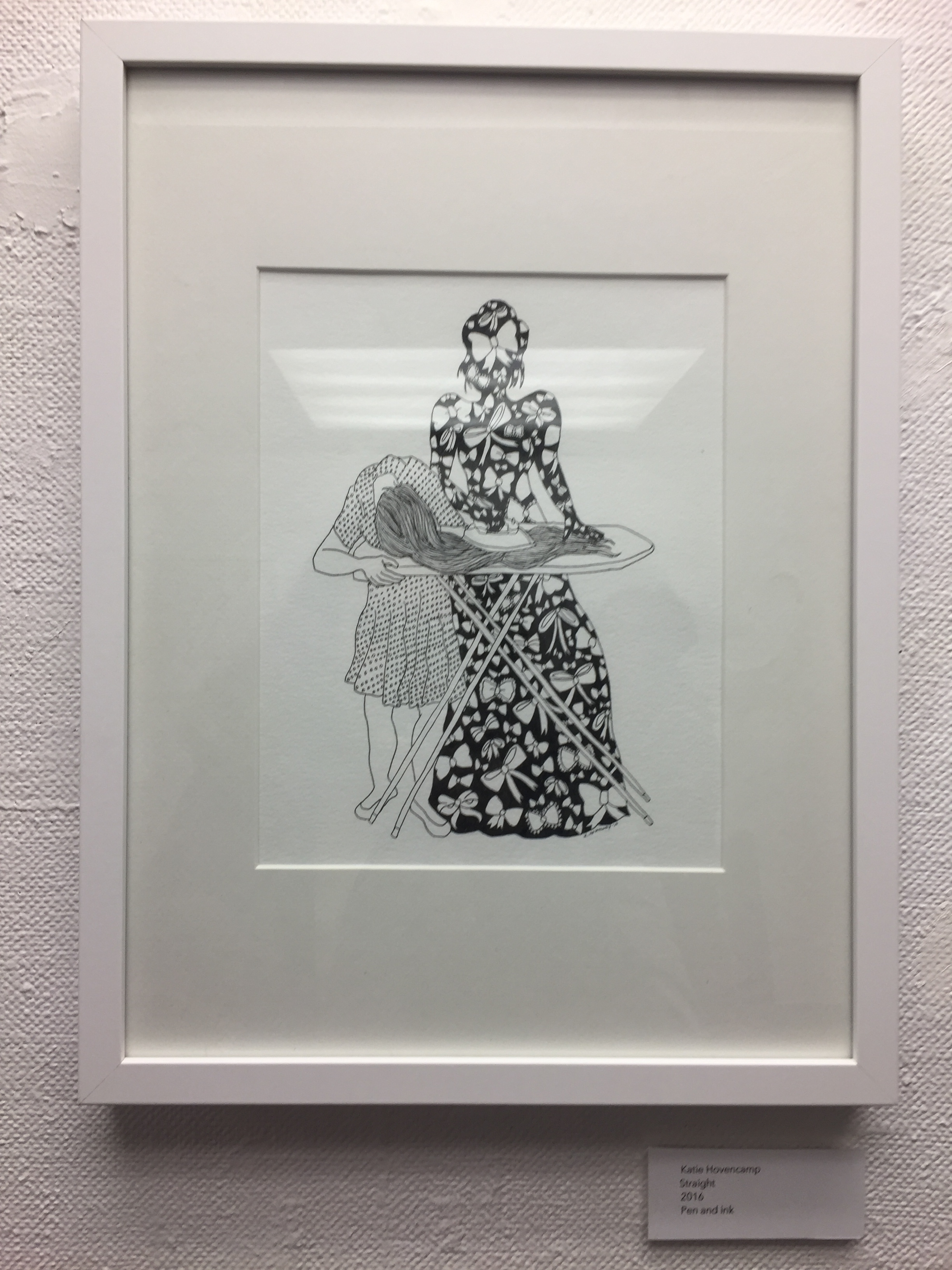 Woman getting her hair ironed