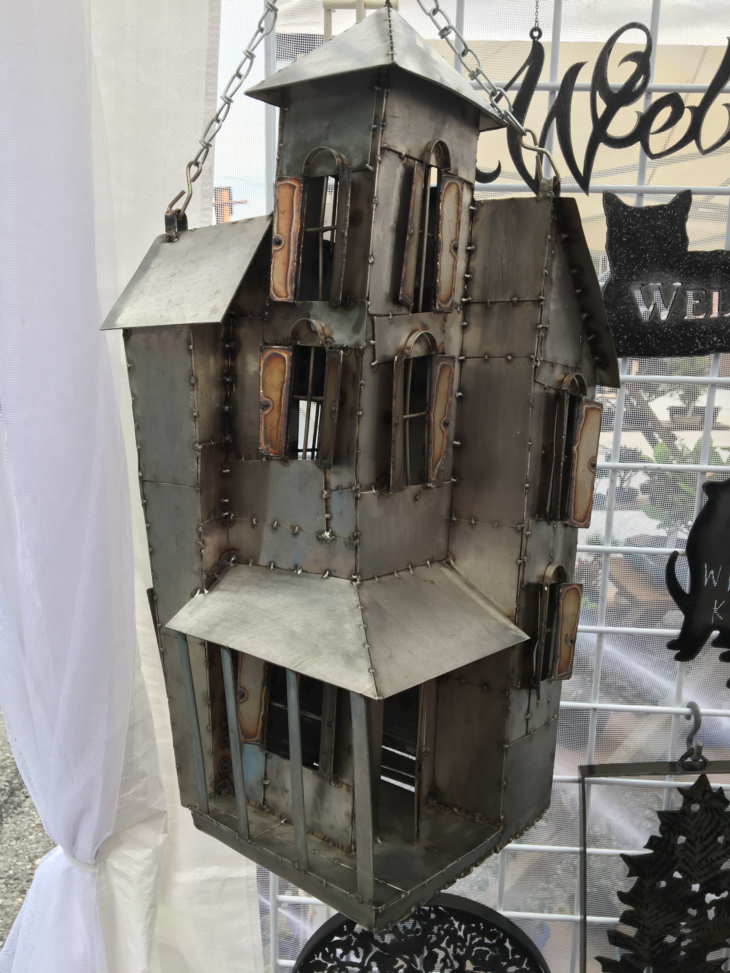 Metal house sculpture