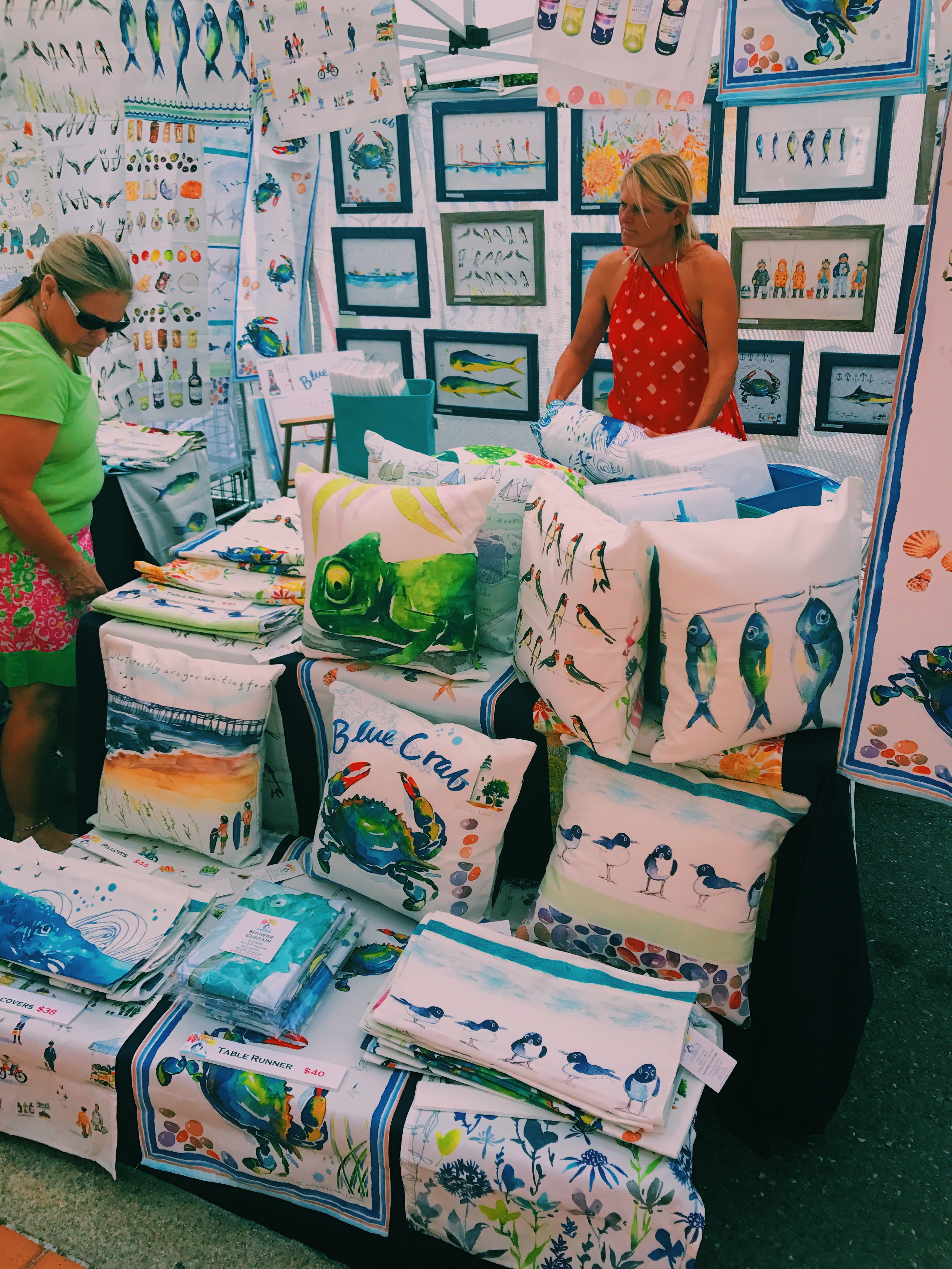 pillows with crabs and fish designs on them
