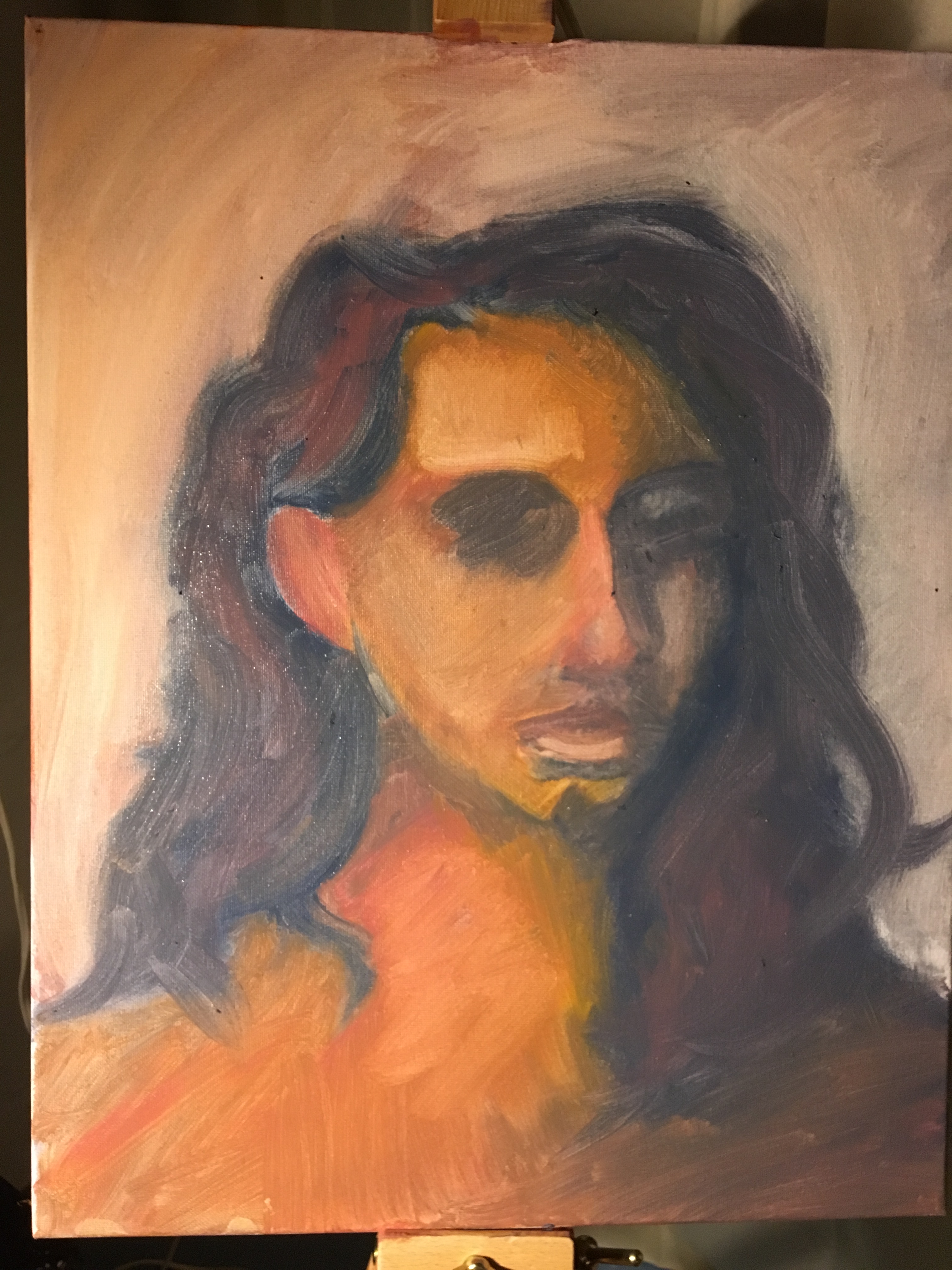 first layer of portrait on canvas. Thinned out oil paints with darker colors