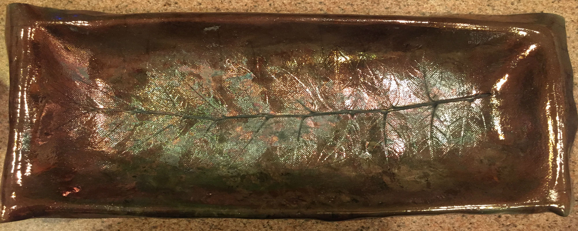 Copper colored ceramic tray