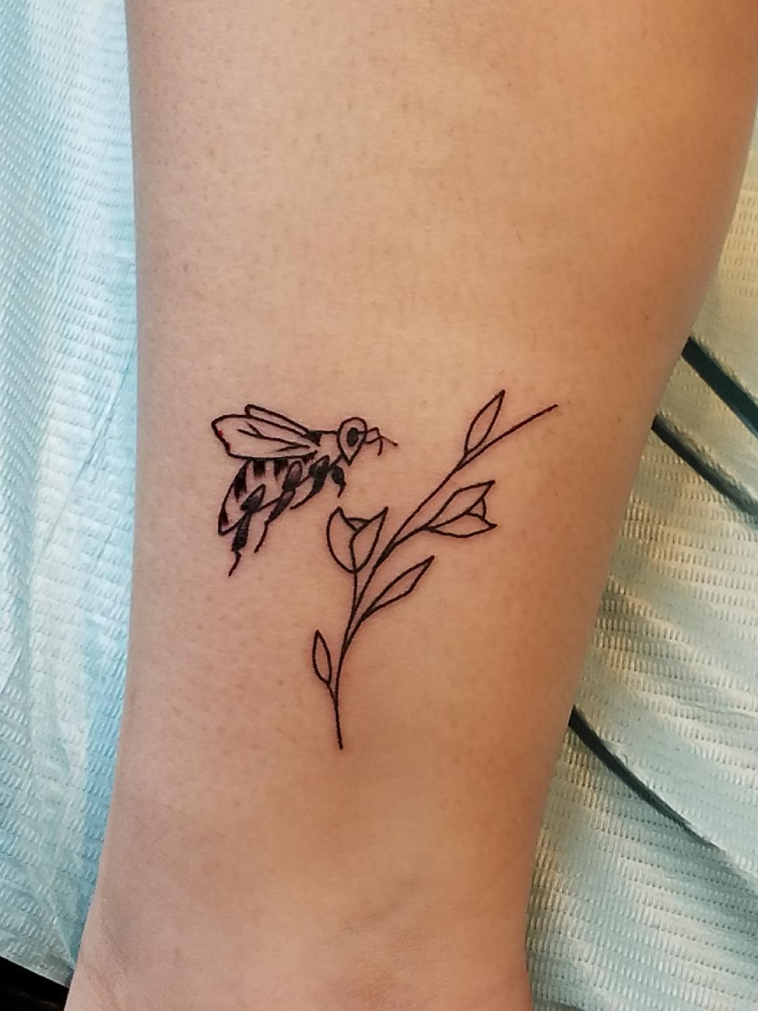 bee tattoo on ankle