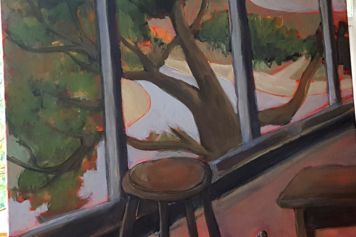 closeup photo of landscape painting from inside