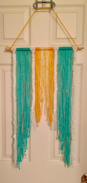 strung and braided yarn hanging