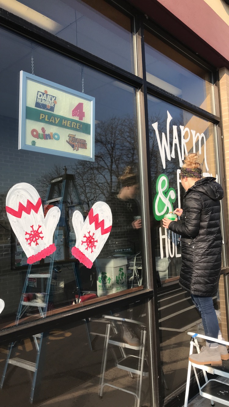 girl working on window design