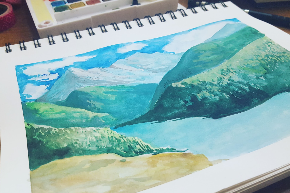 A watercolor drawing of mountains