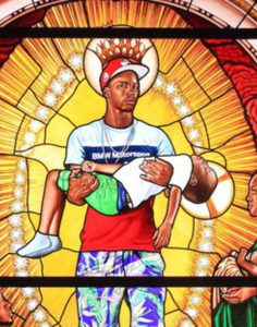 The man holding the boy in Mary, Comforter of the Afflicted