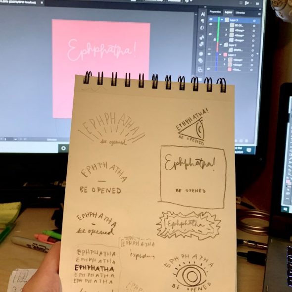 sketchbook with illustrator file open on screen