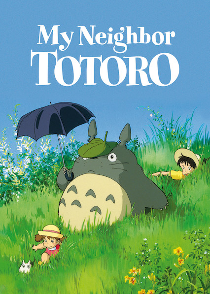 Totoro and two kids in a field