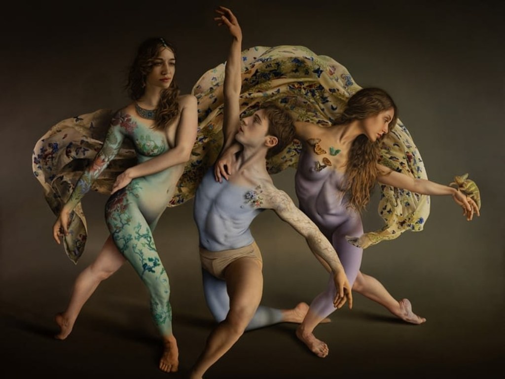 This work displays three figures in elegant, almost ballet-like poses, with somber, unlively gazes. Two women are seen to the right and left of a central male figure, each with a tattooed floral pattern on their skin with a floral drapery wrapped around, bringing each figure together.  