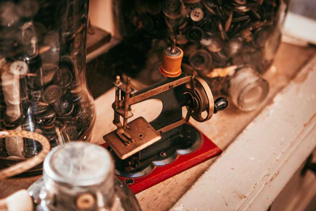 old sewing machine placed on table