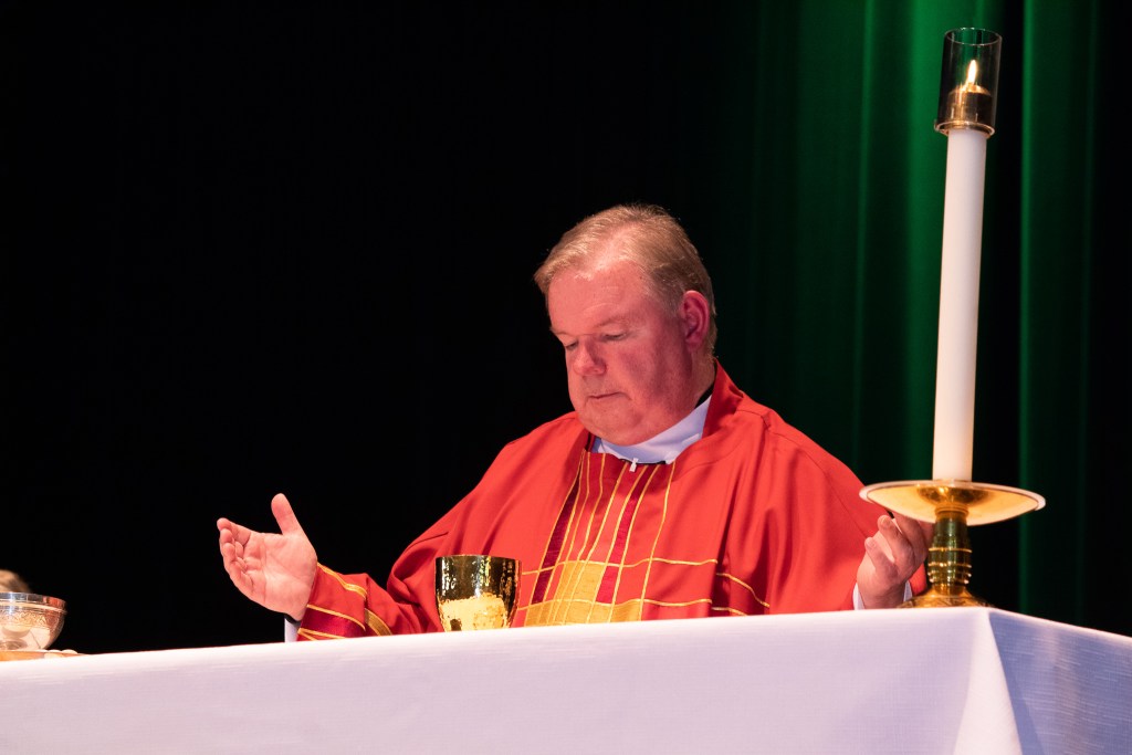 Man leading a prayer