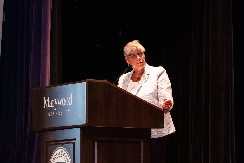 Woman talking at podium