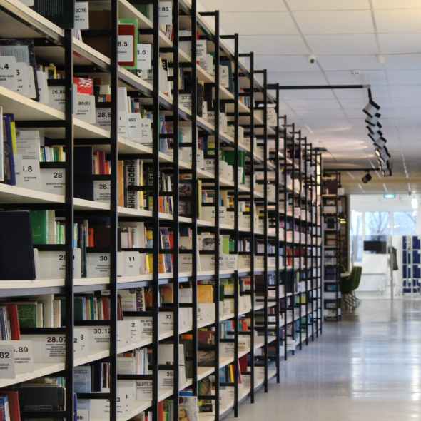 stack of books in shelf