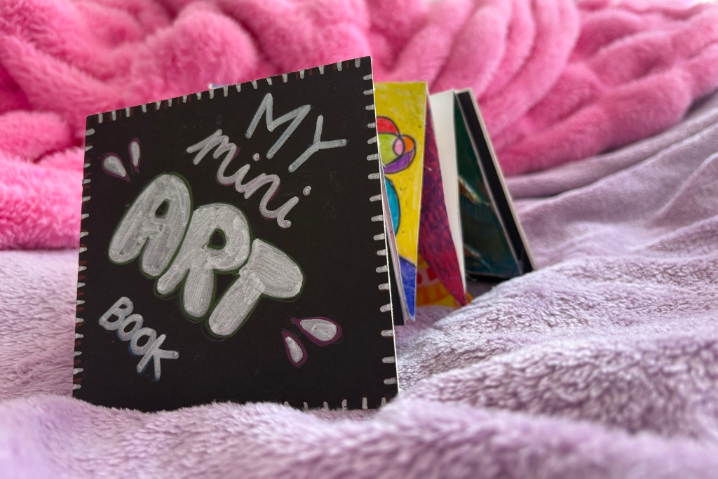 Mini art book standing up.