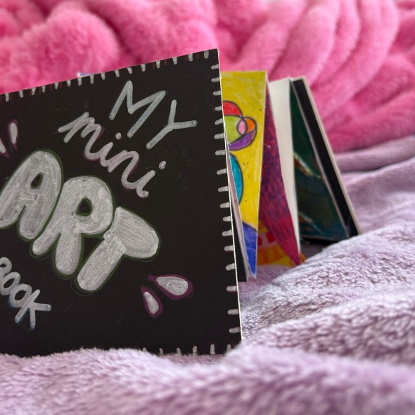 Mini art book standing up.